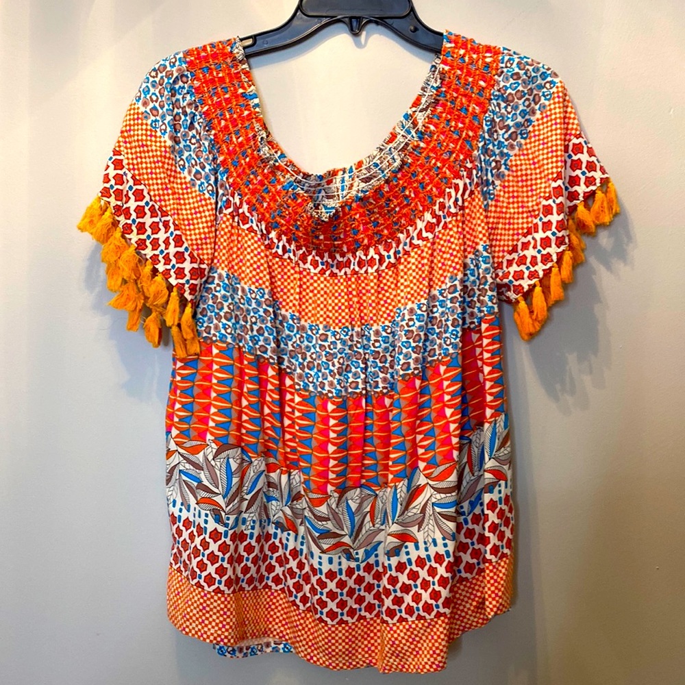Vibrant on or off shoulder top with fringe sleeve detail